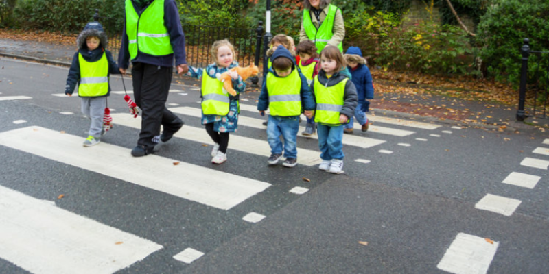Children crossing on a zebra crossing